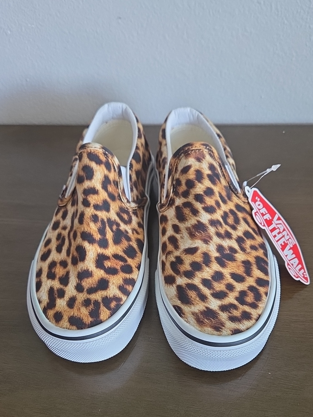 Vans Leopard Slip-On Sneakers in Brown and Black